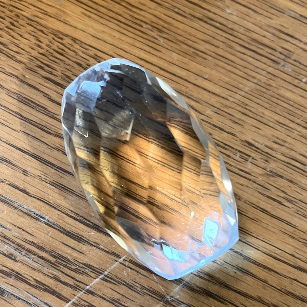Heavy Glass prism style Paperweight . 2 1/2” sparkles and lets the light dance